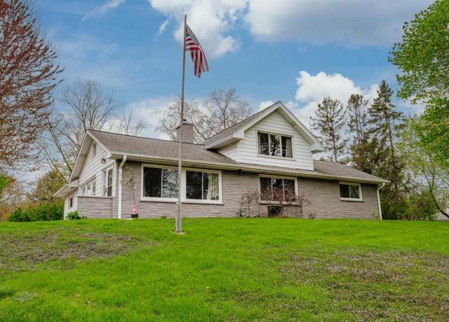 Property at 928 E Wisconsin Ave, Pewaukee, WI 53072, 4 beds, 2 baths
