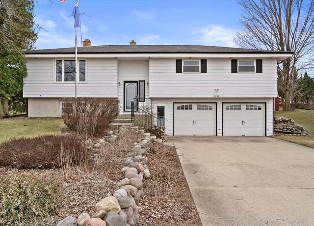 Property at 1618 Terry Dale Dr, West Bend, WI 53090, 4 beds, 2 baths