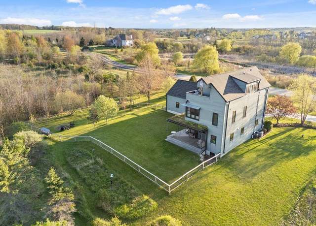 Property at 1038 Lakeland Rd, Grafton, WI 53024, 4 beds, 4.5 baths