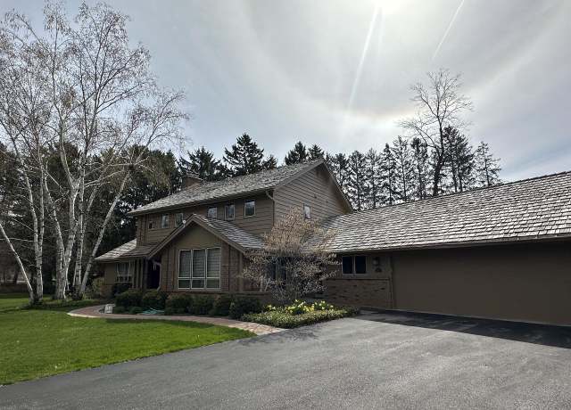 Property at 921 W Green Tree Rd, River Hills, WI 53217, 3 beds, 3.5 baths