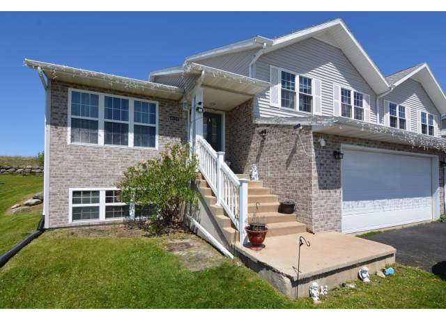 Property at 130 Community Dr, Fall River, WI 53932, 3 beds, 2 baths