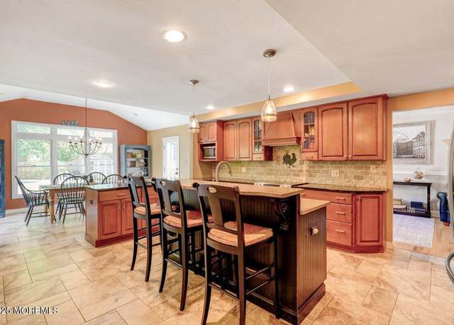 Property at 21 Devon Dr, Manalapan, NJ 07726, 4 beds, 2.5 baths