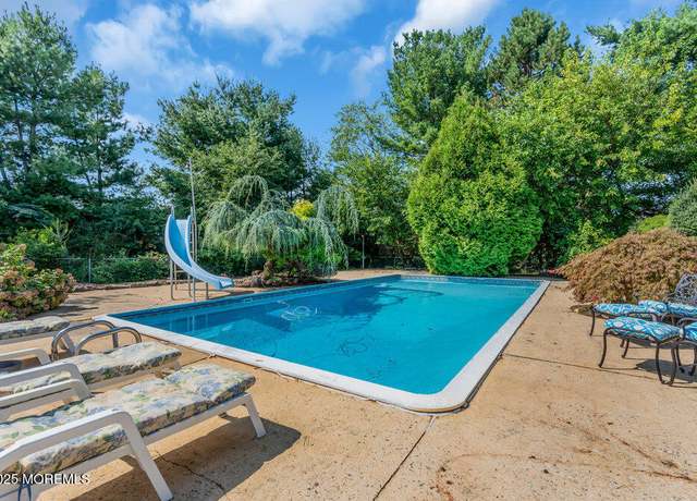 Property at 1 Flintlock Rd, Freehold, NJ 07728, 5 beds, 2.5 baths