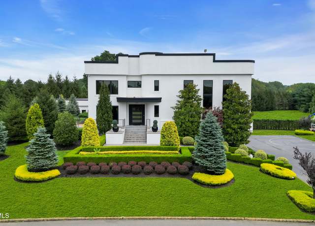Property at 220 Peacock Ln, Morganville, NJ 07751, 3 beds, 4.5 baths