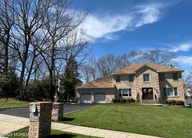 Property at 3 Country Oaks Dr, Manalapan, NJ 07726, 4 beds, 2.5 baths