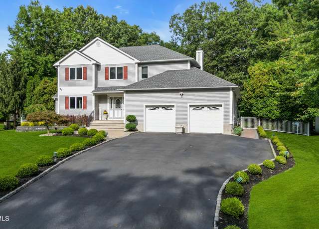 Property at 102 Greenwood Rd, Morganville, NJ 07751, 4 beds, 3.5 baths