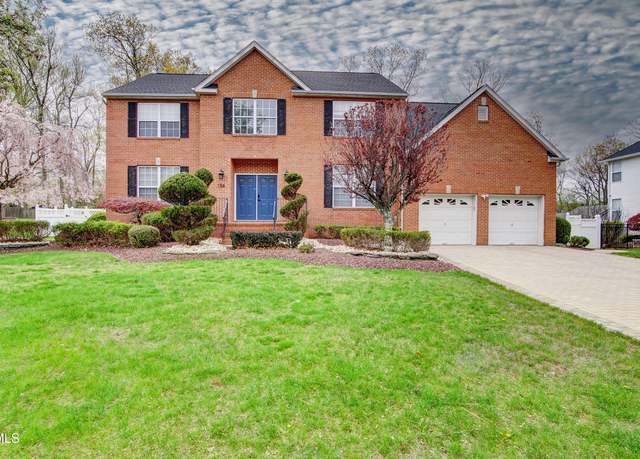 Property at 154 Serpentine Dr, Morganville, NJ 07751, 5 beds, 2.5 baths