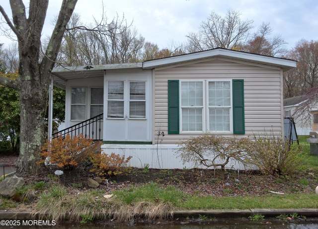 Property at 32 Village Rd, Morganville, NJ 07751, 2 beds, 2 baths