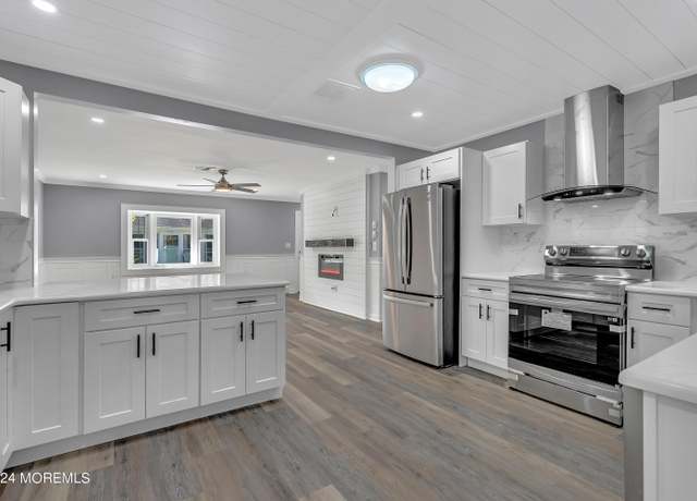 Property at 61E Buckingham Dr, Lakewood, NJ 08701, 2 beds, 2 baths