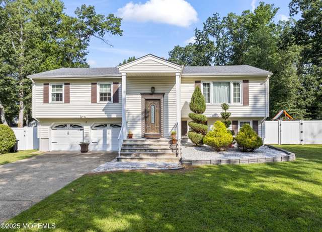 Property at 1 Vicksburg Dr, Manalapan, NJ 07726, 4 beds, 2.5 baths