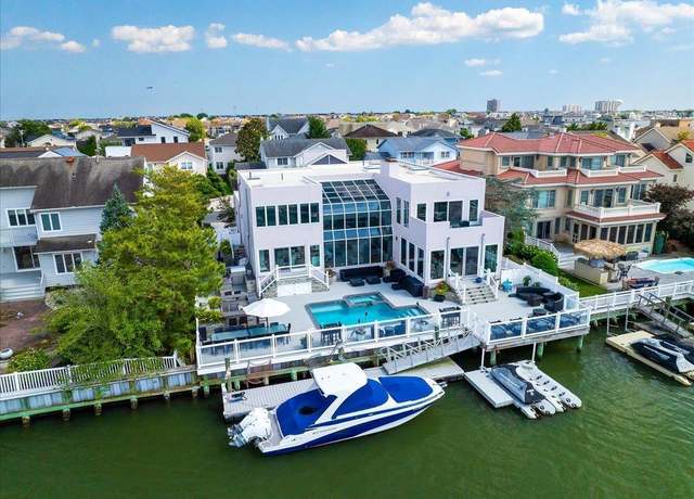 Property at 8205 Lagoon Dr, Margate, NJ 08402, 4 beds, 4 baths