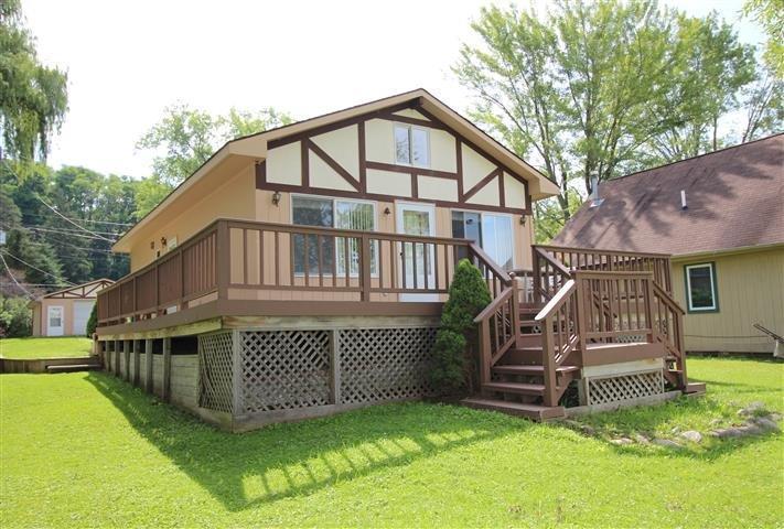 homes for sale on half moon lake pinckney mi
