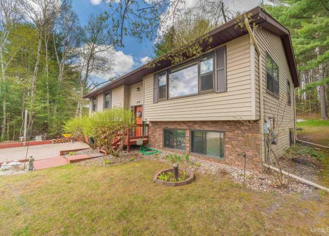 Property at 213 Judy St, Marquette, MI 49855, 5 beds, 3 baths