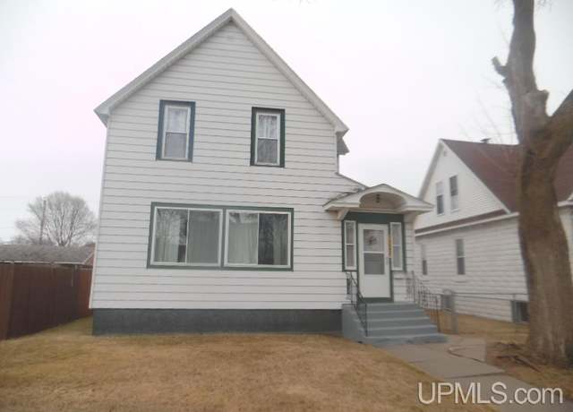 Property at 1222 Stephenson Ave, Escanaba, MI 49829, 4 beds, 2 baths