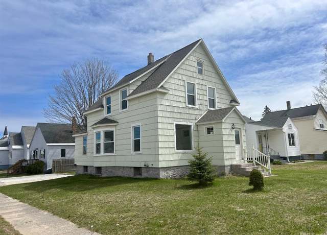 Property at 301 E Chocolay St, Munising, MI 49862, 4 beds, 2 baths