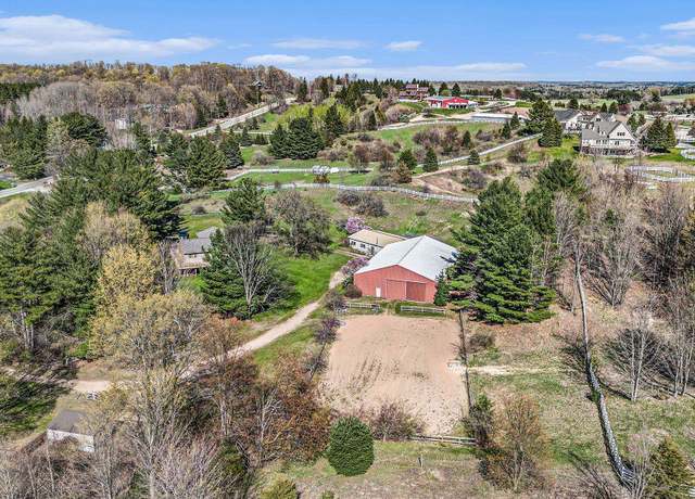 Property at 6036 Brackett Rd, Williamsburg, MI 49690, 4 beds, 3 baths