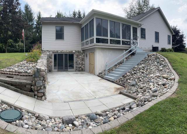 Property at 1225 8 Mile Rd, Kawkawlin, MI 48631, 3 beds, 2.5 baths