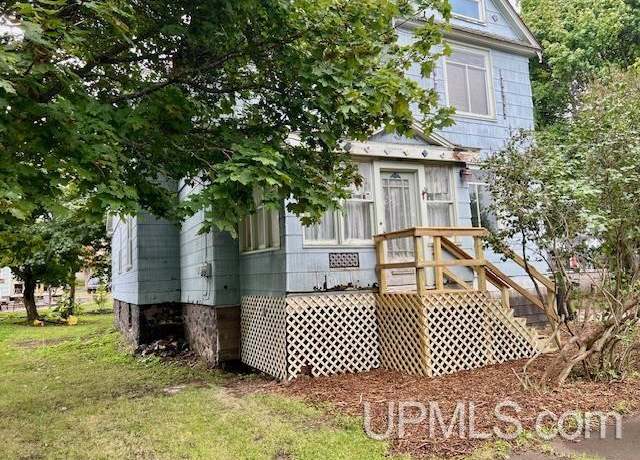 Property at 114 Ahmeek St, Laurium, MI 49913, 4 beds, 3 baths