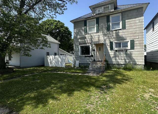Property at 215 N 10th St, Escanaba, MI 49829, 4 beds, 2 baths