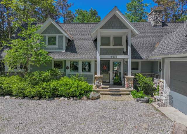 Property at 5635 N Leland Woods Dr, Leland, MI 49654, 4 beds, 4 baths