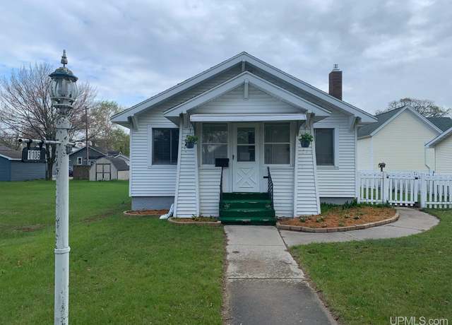 Property at 1106 11th Ave, Escanaba, MI 49829, 2 beds, 2 baths