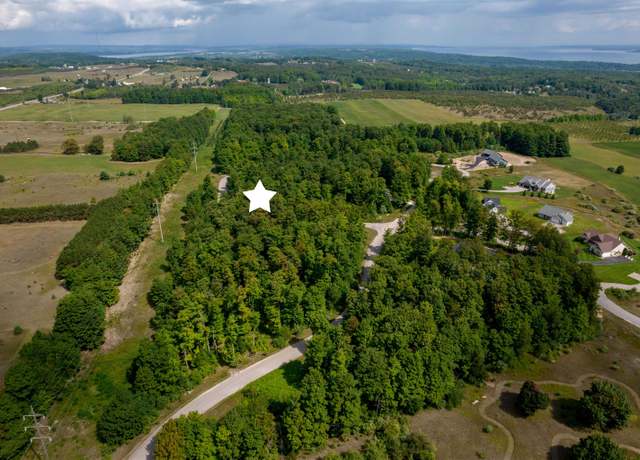 Property at 8271 E Boca Vista Trl Lot : 25, Traverse City, MI 49684