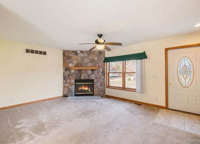 Property at 509 Miller Lake Rd, Columbiaville, MI 48421, 4 beds, 2 baths
