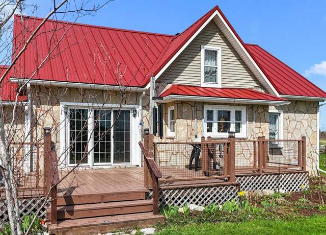 Property at 4652 Cairn Hwy, Kewadin, MI 49648, 4 beds, 3 baths