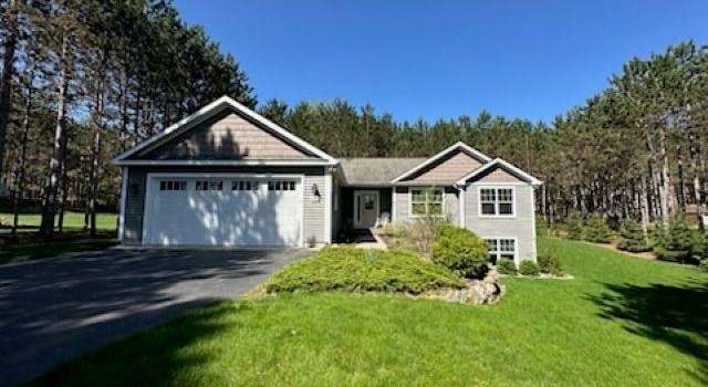 Photo of 4175 Weatherwood Dr, Traverse City, MI 49685