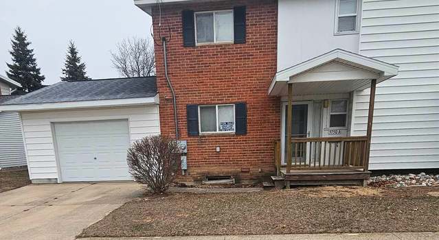 Photo of 9750 8th St Unit A, Oscoda, MI 48750