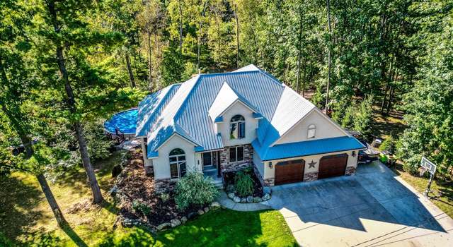 Photo of 1421 Woodlawn Ave, Clare, MI 48617