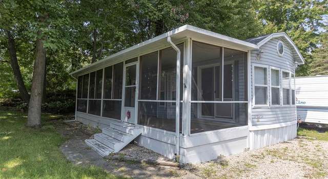 Photo of 978 Timberlynn Trl, Sanford, MI 48657