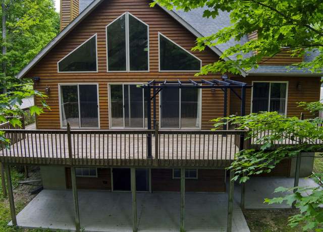 Property at 2625 Wild Coyote Dr, Interlochen, MI 49643, 4 beds, 3.5 baths