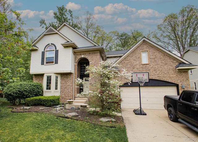 Property at 1418 Trailside Blvd, Wixom, MI 48393, 4 beds, 2.5 baths