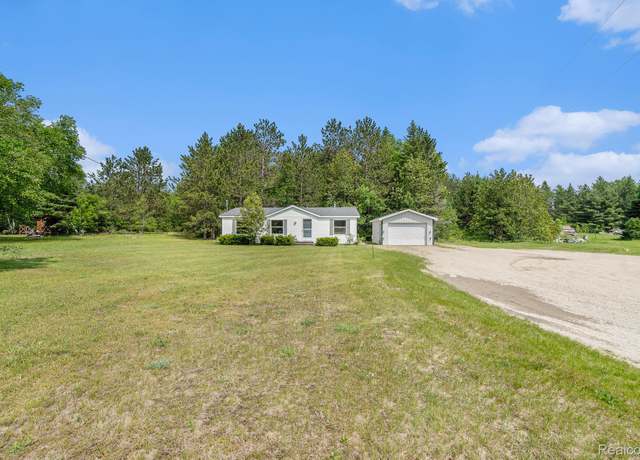Property at 12342 N Mackinaw Hwy, Carp Lake, MI 49718, 3 beds, 2 baths