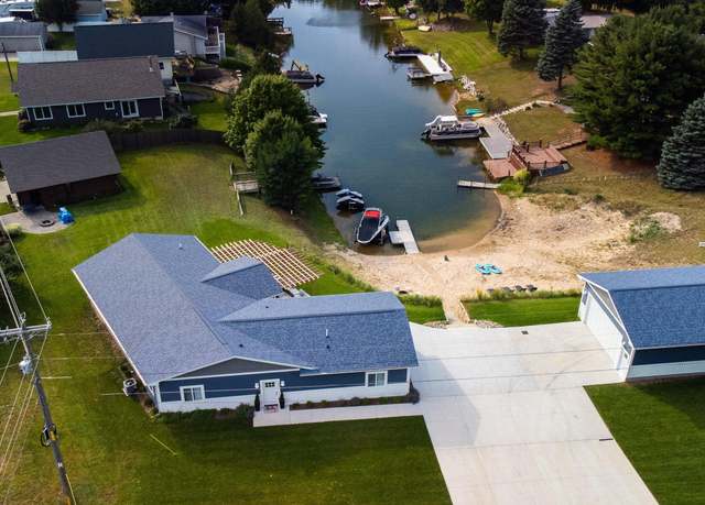 Property at 1641 N Arrowhead Rd, Mears, MI 49436, 5 beds, 3 baths