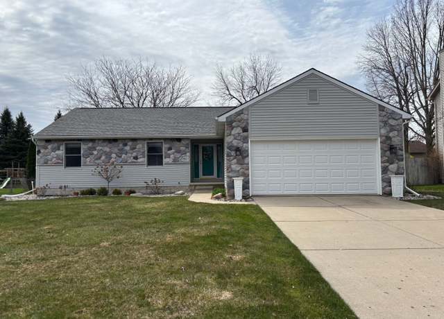 Property at 5855 Caleta Dr, Lansing, MI 48911, 3 beds, 2.5 baths