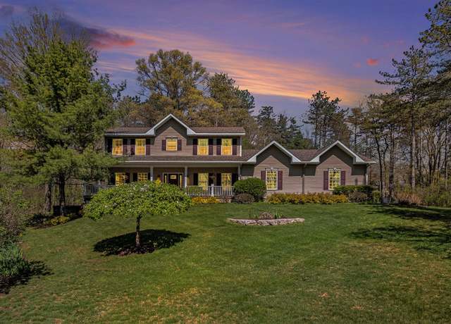 Property at 930 Mccabe Ave NE, Ada, MI 49301, 4 beds, 3 baths