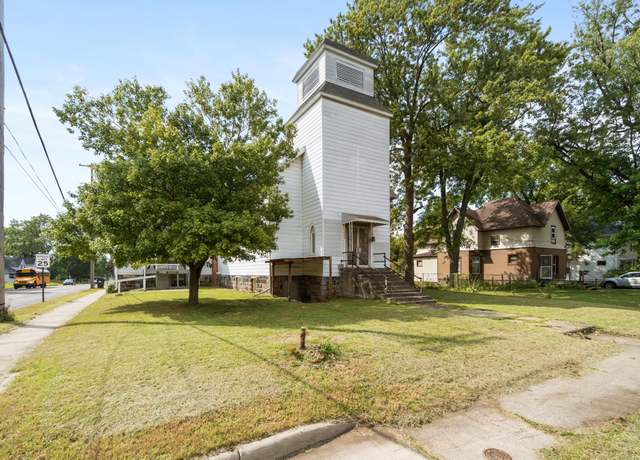 Property at 1302 Cooper St, Jackson, MI 49202, 3 beds, 2 baths