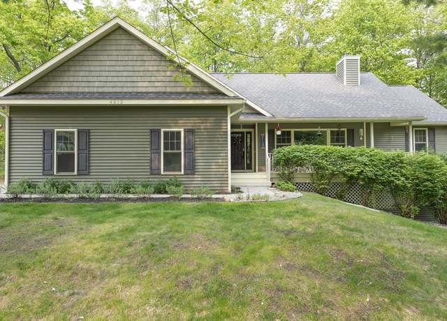 Property at 4212 Weatherwood Dr, Traverse City, MI 49685, 4 beds, 3 baths