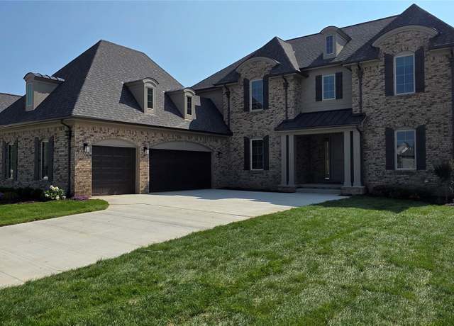 Property at 55590 Laurel Oaks Ln, Macomb, MI 48315, 4 beds, 3.5 baths