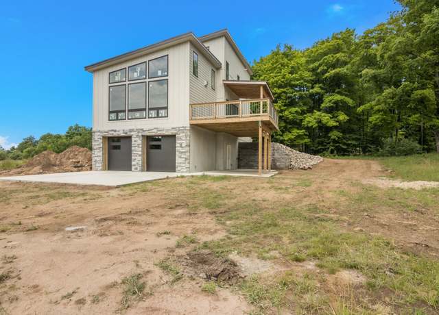 Property at 136 Mooney Way, Kewadin, MI 49648, 3 beds, 3 baths