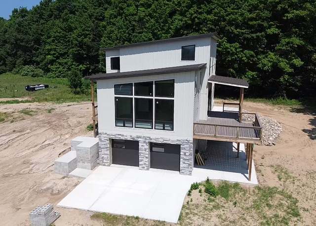 Property at 136 Mooney Way, Kewadin, MI 49648, 3 beds, 3 baths