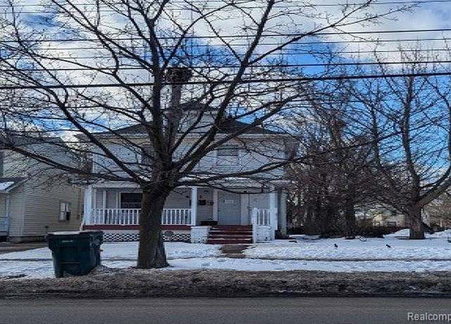 Property at 421 N Pennsylvania Ave, Lansing, MI 48912, 4 beds, 2 baths