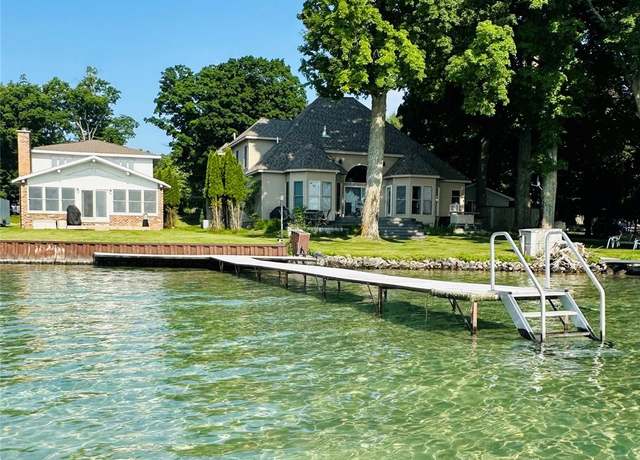 Property at 11375 SW Torch Lake Dr, Rapid City, MI 49676, 4 beds, 2 baths