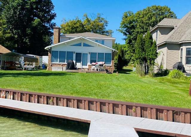 Property at 11375 SW Torch Lake Dr, Rapid City, MI 49676, 4 beds, 2 baths