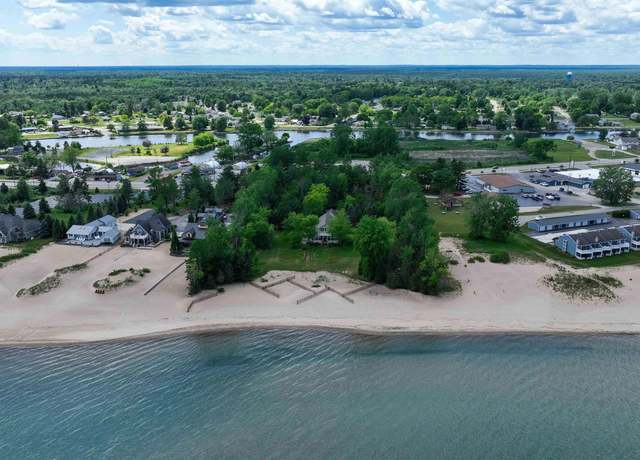 Property at 879 S State St, Oscoda, MI 48750, 4 beds, 3 baths