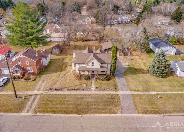 Property at 329 N Fourth St, West Branch Twp, MI 48661, 5 beds, 2 baths