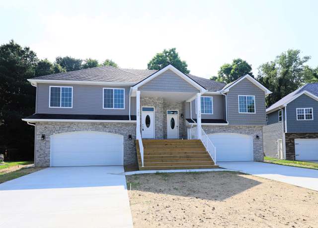 Property at 180 Whispering Pines Dr, Fenton, MI 48430, 3 beds, 3 baths