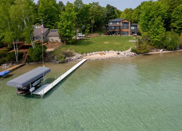 Property at 11767 Wild Cherry Ln, Kewadin, MI 49648, 6 beds, 3.5 baths